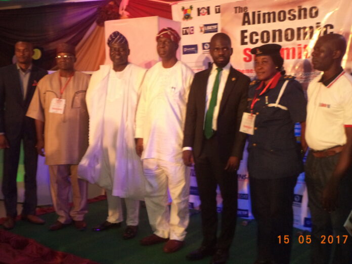 They came in a group, decked in blue Akara fabrics, with bright countenances and much expectation. They are members of Lagos State Council of Tradesmen and Artisan, LACOSTA, Alimosho. They were among the huge number of participants that converged at one of the expansive halls of De Santos Hotels, Akowonjo, Alimosho, on Monday, May 15th, for the much anticipated Alimosho Economic Summit- the first of its kind in the history of Alimosho Local Government Area, Lagos. The theme of the summit was, ‘Exploring Real Investment Opportunities, For Economic And Developmental Rebirth’. The summit is a an initiation of Abel Lazarus, publisher of The Alimosho Mail newspaper, a grassroots publication with support from Vintage Press Limited, publisher of The Nation Newspaper and Lagos State government. According to Lazarus, the essence of the summit was to discuss how Alimosho, being one of the largest local government areas in Nigeria, can be made economically vibrant. Some of the objectives of the summit include: to peruse the potentials and possibilities in Alimosho;to discuss the challenges and opportunities of multiple economic growth and development in Alimosho and its environs and to discuss the need for a creative policy-driven investable economic harmonization for public-to-private sector drive and partnership for local development areas. Dignitaries present at the summit include amongst others - Quadri Ganiyu, sole administrator, Alimosho LGA, Sam Omatseye ,chairman, Editorial Board, The Nation Newspaper, Akintunde Oyebode, executive secretary, Lagos State Employment Trust Fund, LSETF, Ademola Osibeluwa, CDC Chairman Igando-Ikotun, Joel-Ezeogwu Nwanna, Chief Commercial Officer, ACCION Microfinance Bank, Kehinde Bamigbetan, special adviser to the Governor on Communities and Communications, Lagos State,Ojikutu Adeniyi,president, Computer and Allied Product Dealers Association of Nigeria, Ejioma Eze, Divisional Officer, NSCDC, Alausa, Ikeja,Adetokunbo Akinsola, Regional Head, Bank of Industry,BoI, Lagos among others. The event also drew many administrative officers as well as workers of all the LCDAs under Alimosho LGA, students, representatives of some government agencies, corporate organizations, security agencies ,Alimosho, politicians, representatives of Lagos State government, residents, among other stakeholders. The event started at exactly 10:28 a.m. with an opening address by Omotseye. He stressed that with the abundant human and material resources and other opportunities, Alimosho can be self-sustained, vibrant and serve as a model for other local government in the country. “You have a lot of customer-base here, it is just for you to tap into the opportunities”, he said. His address was followed by a presentation, ‘Alimosho City: An investment Haven waiting to be tapped, explored and expanded’. In the presentation, Nariwo Kayode, Business Development Manager, Liberal Consults,spoke glowingly about the potentialities of Alimosho LGA to blossom to one of the leading economic baselines in West Africa. One of the strengths of Alimosho identified in the presentation is population. According to Kayode,with an estimated average growth of 20,000 persons monthly, Alimosho now has a population of over 4 million people. In fact it was also revealed that 70 per cent of the immigrants in Lagos, move to Alimosho. The population figure has made Alimosho a decider in political calculations and a giant for economic considerations. Kayode noted that Alimosho LGA is a destination for real estate business with over 70 estates. Kayode believes Alimosho is well positioned in the comity of communities that abound in Lagos State with many entry and exit points. For instance, the LGA is about 5 minute-drive-distance from Ikeja, the capital of Lagos, it’s about 25 minute-drive-distance from FESTAC town and about 15-minute-drive distance from Surulere. “It is also close to routes out of the state into Ogun State through Agbado-Oke Odo LCDA, into Sango, Ado-Odo Ota, LGA of Ogun State. Alimosho also serves as route out of the country into Republic of Benin via Badagry into Seme Border, which is ten-minute-drive from Badagry on the coastal road between Lagos and Cotonou. Also, the proximity of Alimosho LGA to the prominent Murtala Mohammed International Airport, makes it an international destination to prospective investor”, he said. For ease of governance, Kayode said five local council development areas,LCDAa were carved out of Alimosho. They are Mosan-Okunola LCDA, Egbe-Idimu LCDA,Ipaja-Ayobo LCDA,Igando-Ikortun LCDA and Agbado-Oke-Odo LCDA. Beside population and proximity of the local government to some key commercial areas in and without Lagos State, it is believed that the planned construction of the N20 billion worth of standard ICT village at the location of the present second-hand products/clothes market in Kotangura, will go a long way in boosting the chances of the LGA in attracting investment. “ No doubt, Alimosho has positioned itself as a viable location for investors and businesses waiting to be tapped. The lack of infrastructure has remained one of the many excuses that has deprived this local government enough investment; but owing to the zeal of the current administration of governor Akinwunmi Ambode in community development, which he has so far been demonstrated by the approval of some basic infrastructure around the LGA, it is now a new dawn for Alimosho. Presenting the keynote address on theme of the summit, Akintunde Oyebode,Executive Secretary. LSETF,described Alimosho as a hub of consumer market in the state. He diligently reeled out some of the infrastructural developments carried out by the state government in Alimosho LGA. The LSETF boss also stressed the significant roles of MSMEs in the economic development of Alimosho. He said MSMEs present the propelling force of economic modernization and growth at large and are an important sector that needs to continue being adequately factored into policy making and programme implementation in every national and private sector development policy. “The growth potential of the sector and its critical role in all productive sectors, distribution and value chains can only be underscored”, he said. Oyebode revealed that LSETF has so far supported 223 resident s of Alimosho by financing 178 micro enterprises with the sum of N62,million and 45 small and medium enterprises with over N150 million. Despite this commendable gestures from the government, Oyebode said MSMEs and entrepreneurship will still have to overcome certain constraints to grow and compete in global markets. He mentioned lack of management skills, access to financing and technology. He expressed worry that most MSMEs focus on the production of traditional , low value-added goods with varying quality, serving local markets, and competing on the basis of price, hence, very few have the capacity to export and compete in international market. “They do not have any quality control system in place or follow quality control procedures that are in compliance with international quality certification systems and rarely invest heavily in technologies that will add to their products and overall economic perfomance, and exhibit low levels of technology utilization.” Oyebode also noted that the MSMEs are also constrained by some external factors like entry barriers, competition, policies, laws and regulations affecting business activities, which do not sufficiently consider the impact on smaller enterprises in their development and implementation. In addition to this, Oyebode emphasized high input cost, lack of appropriately skilled labour due to an education and training system that is not adequately preparing graduates with employability skills and the low commitment and investment in training workers. For MSMEs in Alimosho,Oyebode said research carried out by his organization found that the biggest challenges for business in Alimosho are access to finance and insufficient power supply. He said LSETF will continue to play its role of providing loans that do not require collateral at an affordable interest rate of 5 per cent per annum. He noted that the issue of power is beyond the full control of the state government, but expressed optimism that it can be resolved.Oyebode stressed that improving the MSMEs is key to the desired economic and developmental rebirth in Alimosho. First, Oyebode said market operators must determine the power needed by the residents and business and design a realistic plan to meet the demand, “it is important that consumers are also ready to play their part by paying the required price for this service”, he said. He added that land owners in Alimosho need to have proper titles of ownership, as well as training of Alimosho workforce in order to ensure businesses that operate in the environment have adequate supply of competent and skilled managers. Many of the participants agreed with the LSEFT boss on his submission about the need for regular power supply for economic growth in Alimosho. Sunday Ayodeji, is one of them. Ayodeji, a business man, said absence of power has forced many craftsmen to abandon their job and go into commercial motorcycling and tricycling popularly known as Keke Marwa. “Until we get power right in Alimosho we will continue to hold this summit and only little will be happening”, he said. Meanwhile, the residents of Ikotun -Igando LCDA, are already working towards that. They have engaged the service of a private energy company, Andrew D. Idowu &Co. to run a pilot programme of embedded power to the communities in few month’s time. Andrew Idowu, managing partner of the company was at the summit. In his presentation, Idowu said his company will be distributing 50,000 units of pre-paid meters free to the community. He stressed that Alimosho has everything that it takes to generate power, “gas pipeline passes through Igando, we have waste-to-energy development, there are several solid wastes mounted all over Alimosho and its sister LCDAs. You can generate up to two mega watts from all the refuse dumps in Igando-Ikotun alone”, he said. Idowu explained that embedded is a programme inaugurated by the last administration to run power community-based. “There is the Embedded Regulation of 2012 and we have the Independent Regulation Network of 2012,where by embedded generation companies can run power plants in communities. They will not run through the grid, they will run through the mini grids in the community, and the independent electricity distribution network will run their distribution network within the DISCOs purview. The DISCOs will just allocate location to them and they will be able to distribute within on behalf of the DISCOs. So they will pay the DISCOs for the use of the network and in that wise like Igando-Ikotun where we have six wards, we will now allocate six locations so that we manage ward A,B,C,D,E,F,G easily. As big as Lagos is, Ikeja DISCO cannot manage everything. Let them give them 50,000mw a day, they will still have challenges. Aside from generating powers, we are going to give out meters. No one company can run it, constellations of companies working into the value chain are coming on board. In generation we have four value chains, the generation areas, we have three value chains, the distribution itself, we have seven value chains. Without research of eight years that is what we came up with. We gave our presentation to National Electricity Regulatory Commission ,NERC ,they saw it and they approved that we should go ahead and do it.” “ Now we want to run a pilot of it in Igando-Ikotun and it is the first in the whole country to be run within the community not estate. All the ones we have been having are captives, we want to give it to every man on the street and we are working with Ikeja Electric,I.E, we are still discussing certain things and we are sure there is no going to be any problem to run. We have put into consideration daily consumption which is high, compared to night consumption which is very low, so we will know how to manage and what we generate in the night will be different from what generate in the day and we will be able to understand which is the peak period which is the low period. By then we will now have the accurate data of everybody that can be connected. Today we don’t have. We are going to curtail energy theft because you will use the service based on the amount on your card. It is like your recharge card.” Idowu however noted some of the challenges of power in Alimosho and perhaps in Nigeria. He listed cost of generating and financing power, unwillingness of consumers to pay, distribution challenges, metering maintenance among others. Ademola Osibeluwa, CDC chairman of Igando-Ikotun LCDA, expressed absolute belief in the workability and gains of the embedded power project. “The artisans will be happy work, businesses will thrive and people will be happy. Yes it will be expensive, but if it regular and stable, people will be willing to pay”, he said. The summit was split into three plenary sessions. The first session titled, Community Infrastructure and Security: Strategies, Hopes and Gains, was chaired by Quadri Ishola, sole administrator, Alimosho LGA. In his presentation, A.O. Akinyemi, who represented the lead speaker, Honourable Wasiu Anifowoshe, commissioner of Physical Planning and Urban Development, Lagos State, defined infrastructure as fundamental facilities necessary for the economy to function. It is usually characterized by technical structures such as roads, bridges, water supplies, sewers, electricity fittings, toilets, telecommunication and so on. “It can summarily be explained as physical components of inter-related system providing commodities and services essential to the people.”, he said. For Akinyemi, the availability and consistency of infrastructures are key to achieving economic vibrancy in Alimsoho. With this submission, he said the state government has not failed the people of Alimosho in this regards. He also took time to highlight a number of infrastructural projects carried out by the state government around Alimosho since the administration of Bola Tinubu, the former governor of the Lagos State. In his presentation, Akinyemi also listed some to the factors that have brought about the rapid growth of Alimosho. He mentioned access to international coast lines, international airport, access to Ikeja central business district via Lagos-Abeokuta expressway, access to Lagos Island and Lagos Mainland, availability of lands for agriculture and industrial uses; series of infrastructures and ongoing projects around the LGA. He promised that the government will continue to provide basic infrastructures to improve living standards and economic development of Alimosho towards achieving the mega city status. Speaking in indigenous language, Idowu who was also a member of the panel, reemphasized the importance, benefits and reliability of the embedded power projects. He said that though it will be expensive, it will always be available and Ishola, promised to discuss with him after the event so that other LCDAs can tap into the initiative. Another member of the panel was Eze Ejioma, divisional officer, Nigeria Security and Civil Defence Corps,NSCDC,Alausa,Ikeja. She stressed the role of security in ensuring economic development of Alimosho. She said critical infrastructural facilities must be protected. “To do this, the people in each community must relate and open up to security agencies. They must see the facilities as theirs, they will know the bad elements among them, we need information to act”. Ejioma said Alimosho has the highest number of pipelines running through it and there have been incidents of pipeline vandalisation, “so for all these strategies to thrive we all have roles to play in protecting the facilities”, she said. The session ended with question from audience. First to speak was Jarinatu Amida, chairperson, LACOSTA, Alimosho. She complained about the incessant power failure. “Even if the government empowers us with loan, without power to work, how can we be able to pay back”, she queried. Amida also complained of marginalization of Alimosho artisans during government-sponsored programmes and regular training for her members across the LGA. There were other questions and comments bothering on fake traffic officers in Alimosho and access to loans and the sole administrator promised to do something about the fake local government workers. The second plenary session was titled, SMEs in Agribusiness, Transportation, and Local Content:Way forward for communities. Adetokunbo Akinsola, Regional Head, Bank of Industry,BoI,Lagos,headed the session on behalf of Waheed Olagunju, Ag. Managing Director, BoI.Adeyemi Ajayi,partner,Peniel Consulting was the lead speaker. He began his speech by providing facts and figures to assert the declining state of unemployment in Nigeria and the county’s over-reliance on foreign goods and services. “We produce 25 per cent of our food and we shamelessly import fruits from Cotonou”. Ajayi spoke about the opportunities that abound in the agribusiness, ranging from food preservation to other forms of farming and the chain values. Ajayi said funding should not be seen as challenge, “because you can start small with your savings, you can also raise capital through loans”. He ascribed failure in transportation business to poor management. “One of the reasons we fail is because we treat the drivers and other staff as slaves, whereas we are suppose to treat them like business partner.”, he said. Joel-Ezeogwu Nwanna, chief commercial officer, ACCION Microfinance Bank in her address, said six out of 30 branches of the bank are located in Alimosho LGA. She however noted that unfaithfulness of micro entrepreneurs discourages microfinance banks from providing loans. She noted that one of the basic problems of entrepreneur is the lack of financial discipline. “ We need to learn to separate our lives from the business. Accountability matters a lot in any business”. Nwanna added that her bank has found out that most of the time those who come for loans don’t actually need loan at that stage what they actually need is re-strategizing and financial discipline. Meanwhile, representative of Honourable commissioner for Commerce and Industry, Rotimi Ogunleye, spoke about the commercial and industrial potentials of Alimosho. He stressed that Alimosho was due for establishment of Alimosho Chamber of Commerce and Industry. The question and answer in this session focused more on accessing loans in microfinance bank and Nwanna re-emphasized the need for faithfulness, financial disciplien and other basic requirements for accessing loans in ACCION,like age, residence permit, consent of spouse, nature of business, amount involved and so on. Also, Askinsola responded to questions on modalities of for accessing BoI loans and its areas of specialization. The third plenary session was more like a speech delivery only, because most of the invited panelists could not make it to the summit, except for Kehinde Bamigbetan, special adviser to the governor on Communities and Communications and Ojikutu Adeniyi, president , Computer and Allied Products Dealers Association of Nigeria,CAPDAN. Bamigbetan commended the organizers and assured the audience that the state government will continue to work towards the promotion of economic development of Alimosho. Speaking on the session topic, How Do We Harness Public Private Partnership in ICT to Transform Lagos State From Alimosho Community? Adeniyi said ICT is critical to the economic rebirth of not only Alimosho but the whole country. He reminisced how the popular Computer Village in Ikeja began with young men, “as at 1994 the available computer in Nigeria were not up to ten thousand, now things have changed, and we are still trying to catch up with the rest of the world. We need to double our efforts in ICT training and Alimosho should have holistic approach towards ICT promotion if it is truly serious about the economic rebirth. You could start by training youths especially in software development and later move to other parts”, he said. Soji Omotunde of The Nation Newspaper, made the closing remarks. He urged the participants, especially government representative and other stakeholders to put all that have been said into action and play their roles, so that the desired economic growth and development will be realized in due time. Meanwhile a number of participants applauded the organizers of the summit. One of them was Modupe Akinleye, secretary, Lagos State Council of Tradesmen and Artisan, LACOSTA, Alimosho. “This is my first time of attending a programmed like this and I am very impressed. I leant a lot of things, especially concerning power, accessing loan, Agribusiness. On the issue of financial discipline, when I get back home I will let my people know that they need to learn to cut their coat according to their sizes. That they need to be prudent in their finances and many other things”. She advised the organizers not to relent and do more. Another participant who simply gave his name as Femi Ogunsola, a business man, said the summit has exposed him to some certain thing in agribusiness, “which I will begin to work towards. If an event such as this can be sustained and their recommendations are carried out, Alimosho will be greater, because already we have over 200,000 MSMEs in this local government”, he said. Ogunsola however said the organizer should have invited more of captains of industry, industrialists, CEOs and other potential investors. To this, Lazarus, publisher of The Alimosho Mail and initiator, said, “we are quite aware of this. We had hitches and we had to postpone the event about three times, this created a kind of confusion for the invited CEOs. But so far so good for a maiden edition of a community event like this to have in presence the likes of Akintunde Oyebode, of LSETF, I will give myself a plus. I am fulfilled and there is always a room for improvement. “, he said.